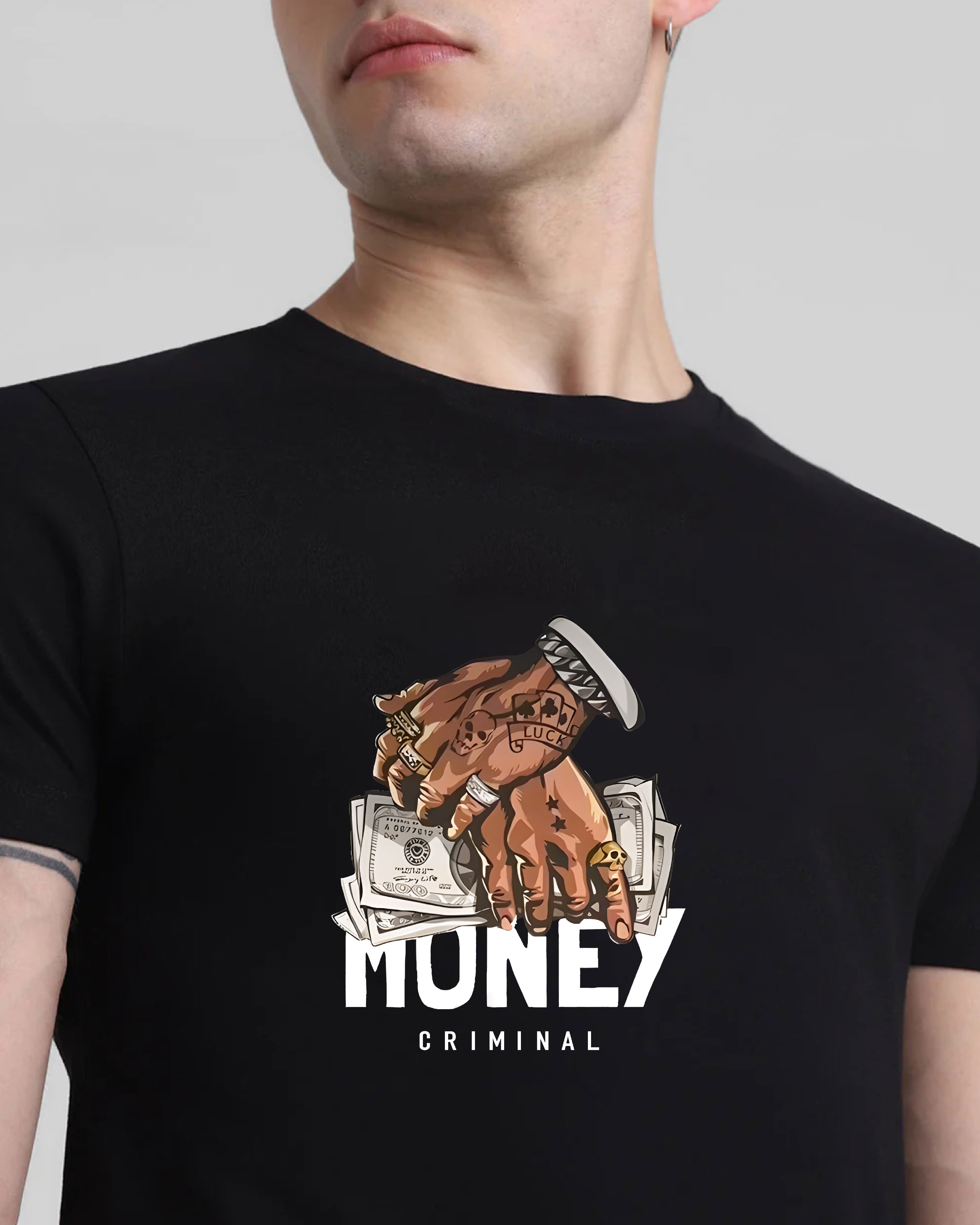 Black t-shirt with a graphic design of a hand holding money and the text 'Money Criminal' on a plain background.
