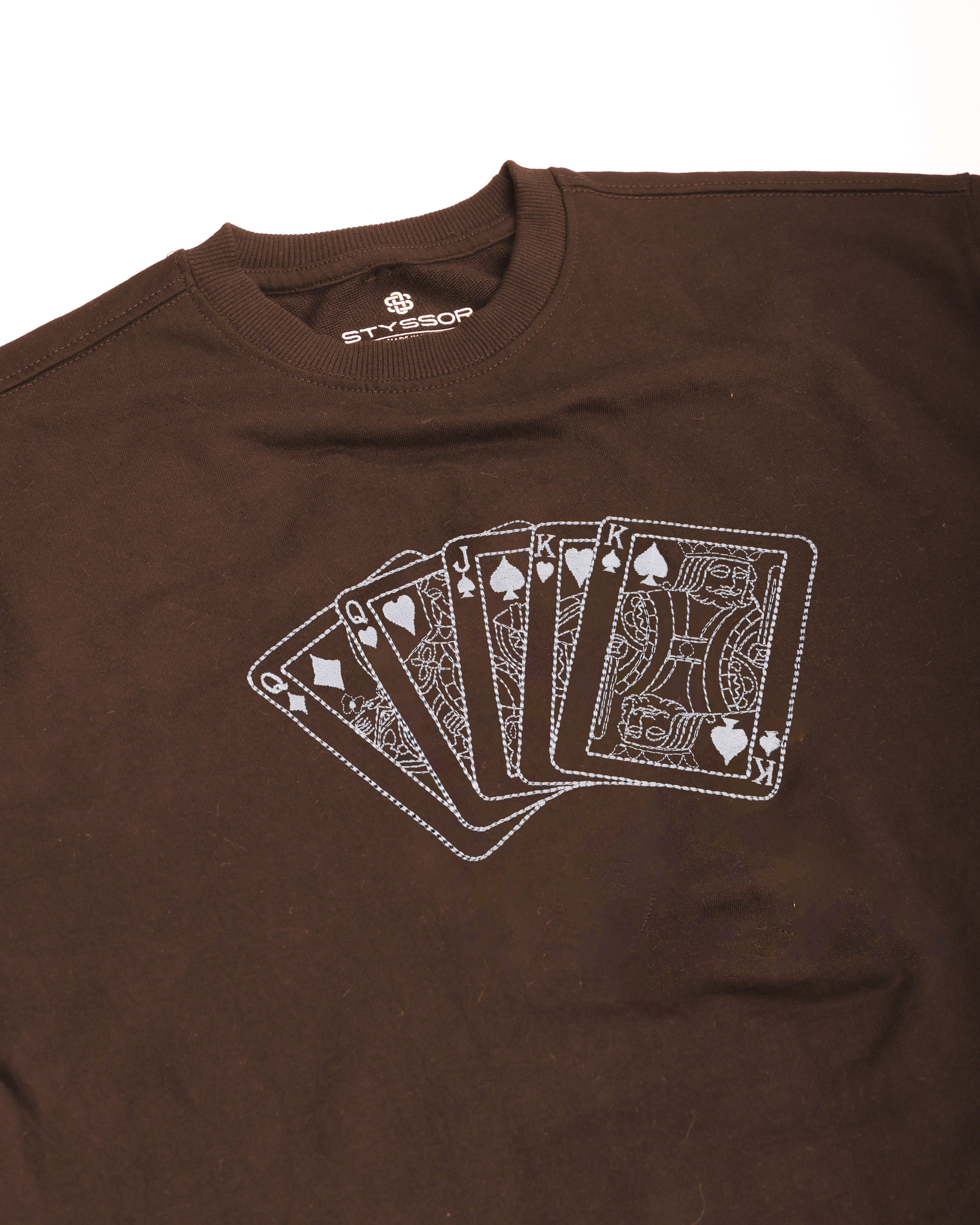 Brown t-shirt with a white playing card design on a white background