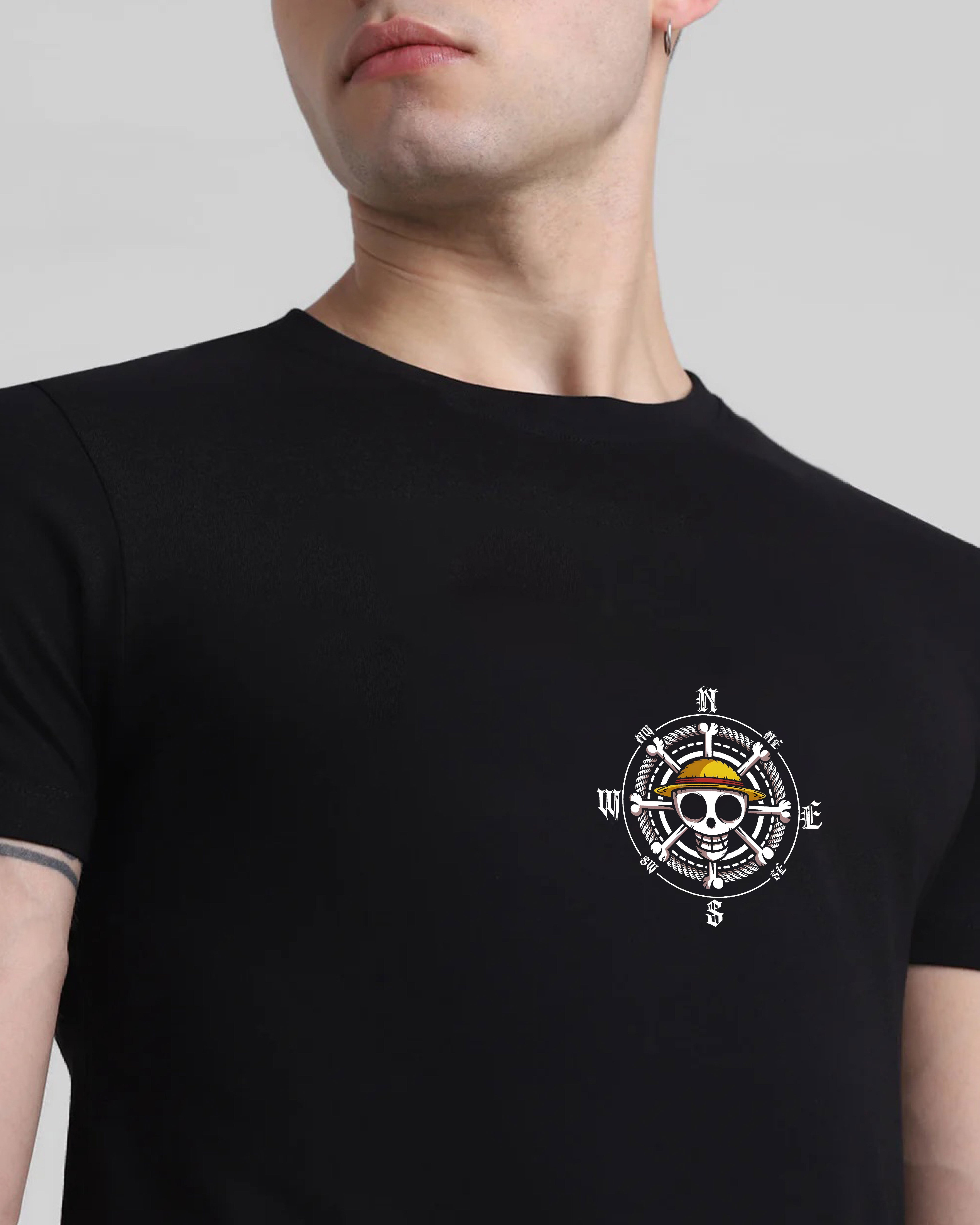 Black t-shirt with a white graphic design on a gray background