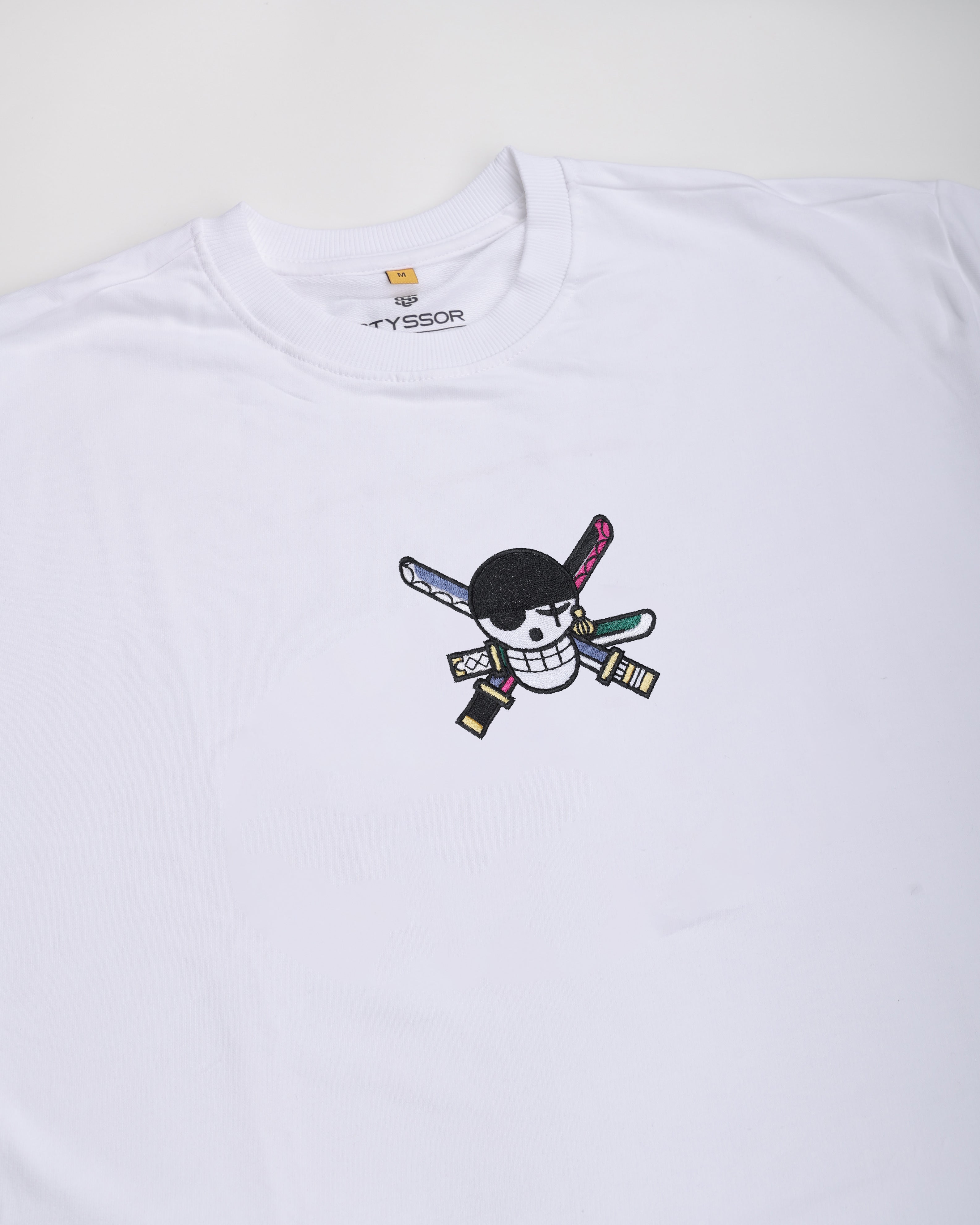 White t-shirt with a graphic design on a white background