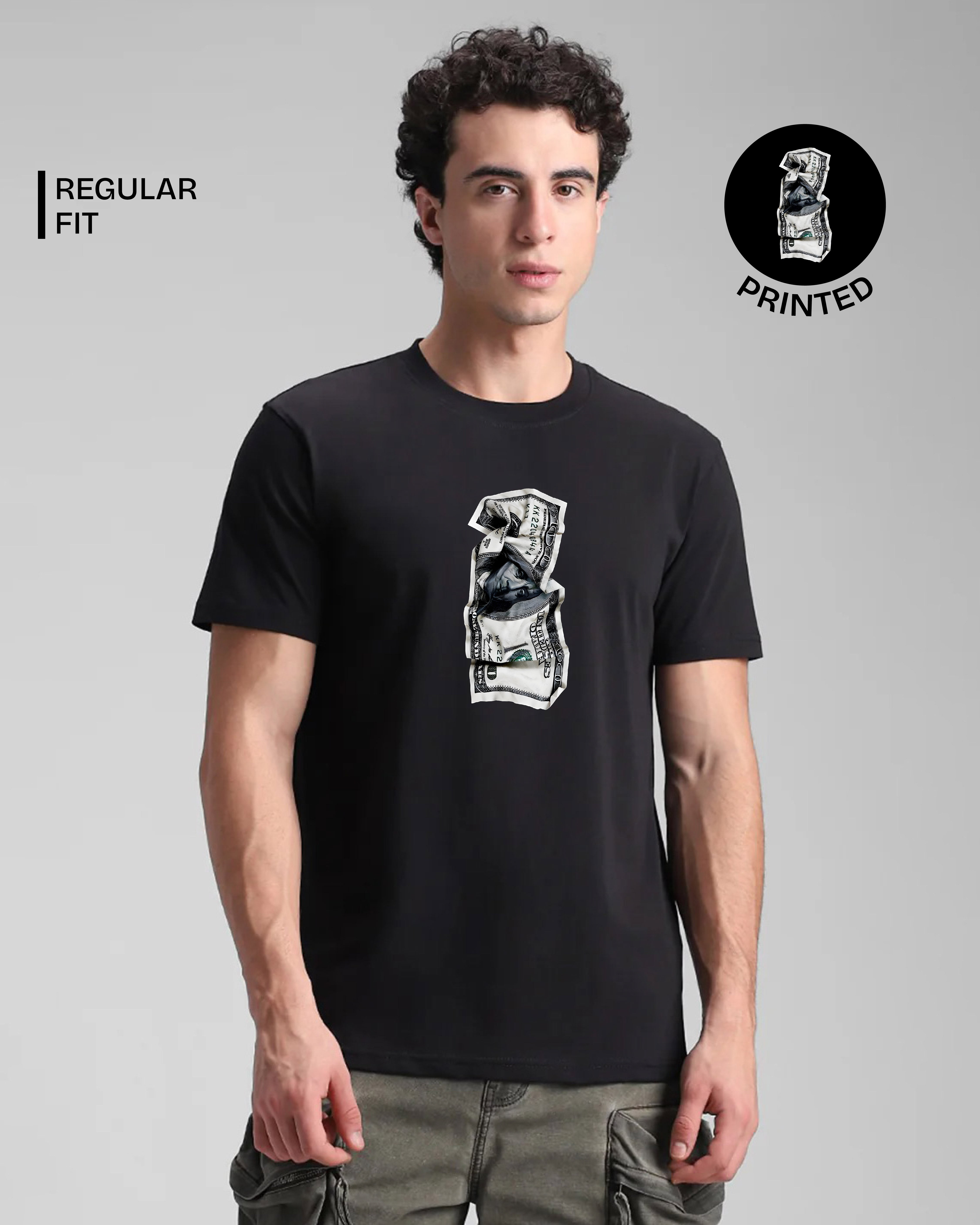Man wearing a black t-shirt with a graphic design on a gray background