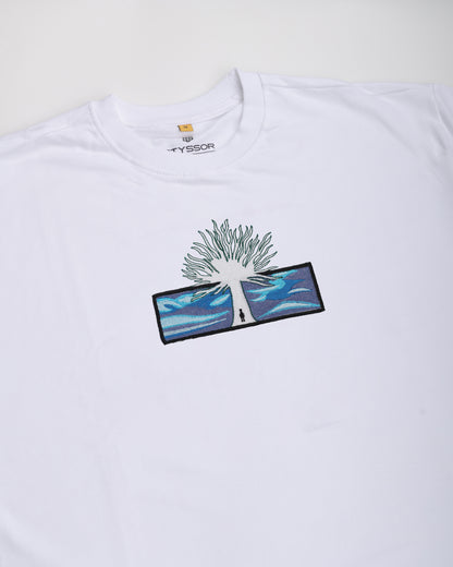 White t-shirt with a tree design and 'Fjällräven' branding on a white background