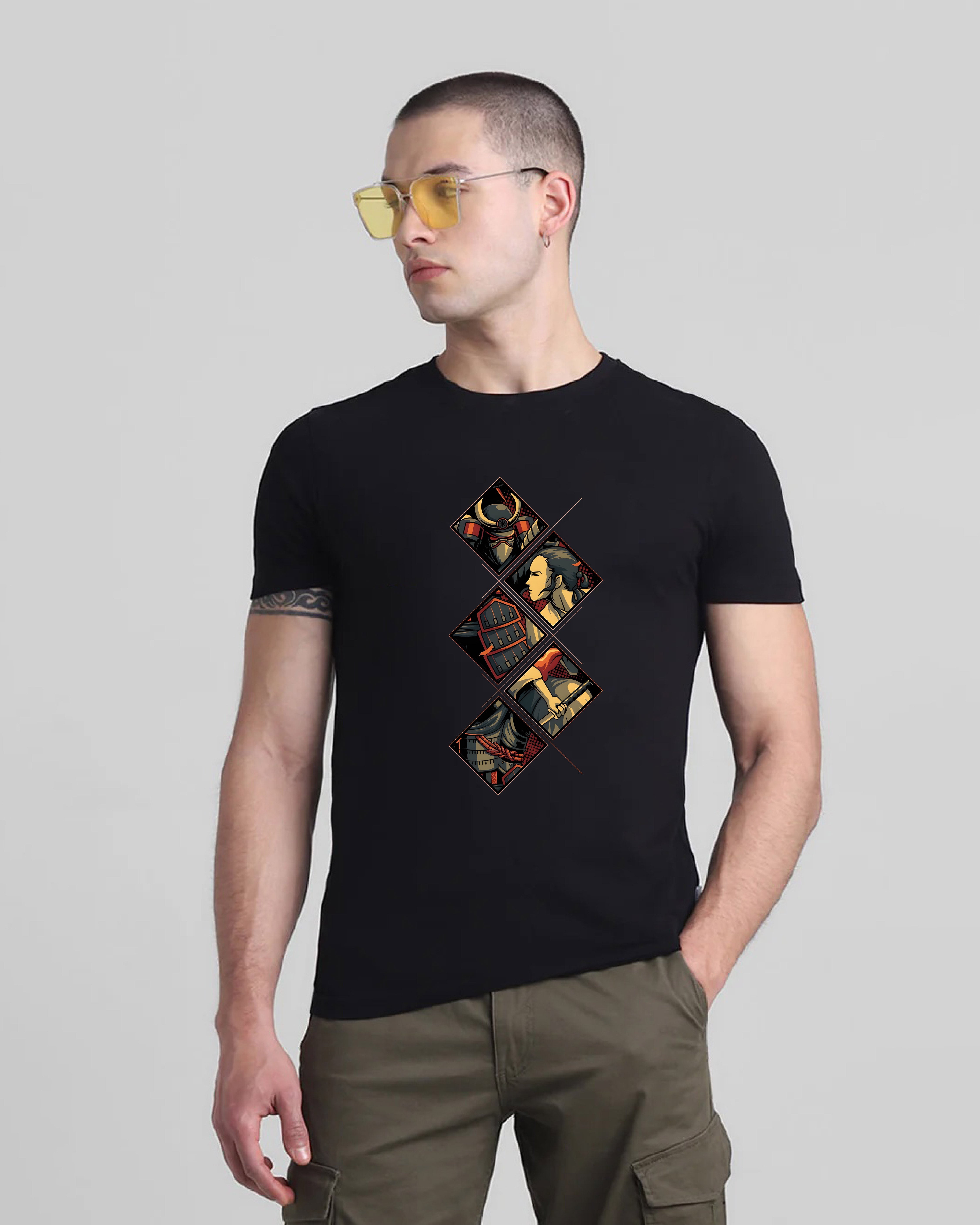 Man wearing a black t-shirt with a graphic design on a gray background