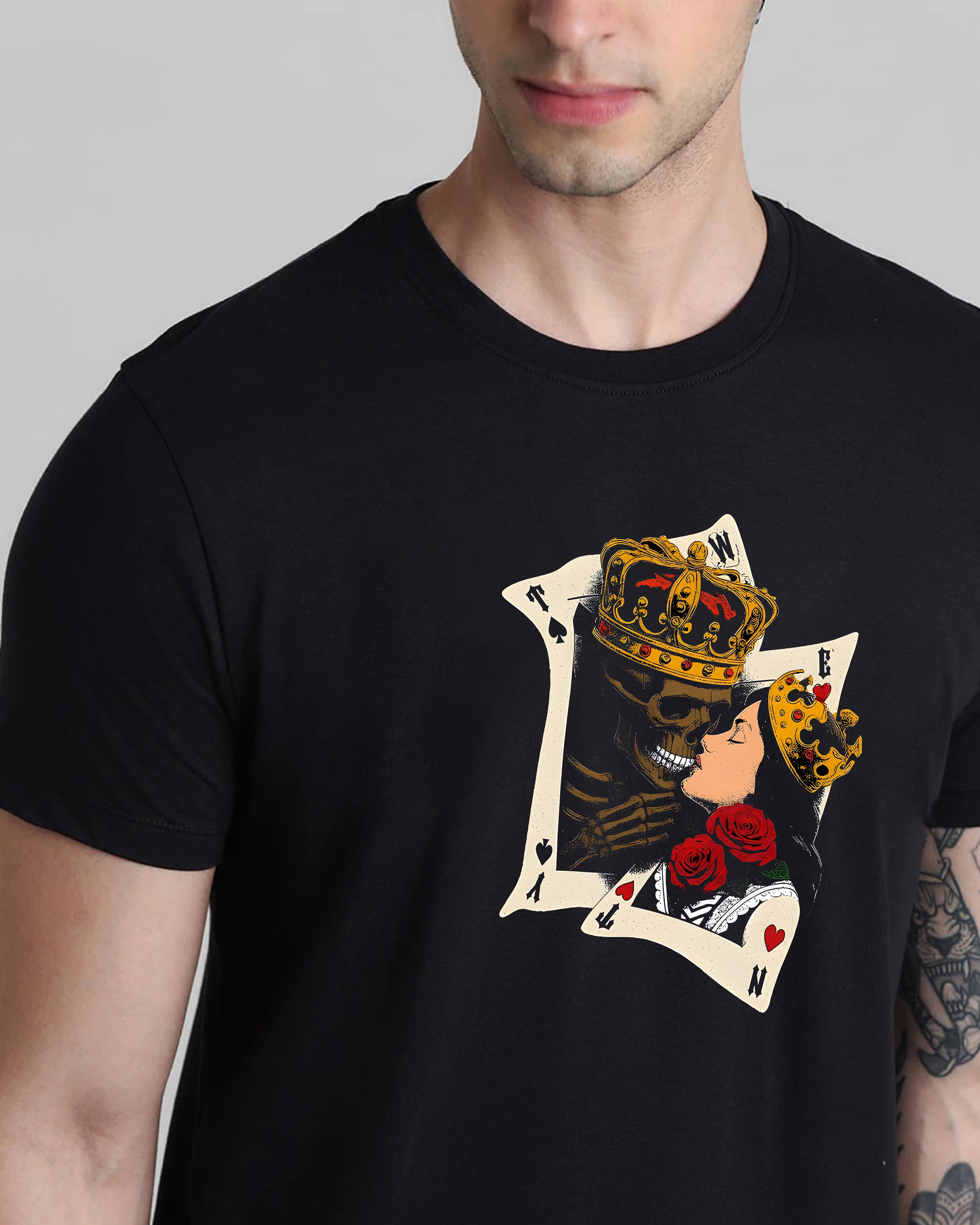 Black t-shirt with a graphic design of a skull wearing a crown and holding roses on a gray background.