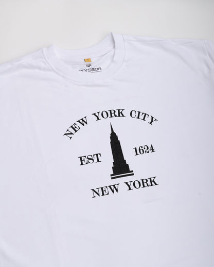 White t-shirt with black 'New York City' and Empire State Building graphic on a white background