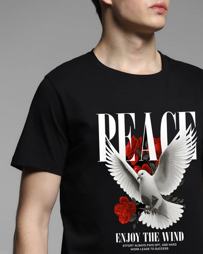 Black t-shirt with a dove, roses, and 'PEACE' text design on a gray background