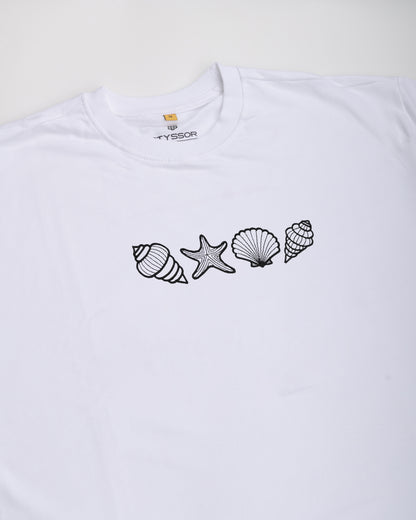 White t-shirt with black shell and starfish designs on a white background