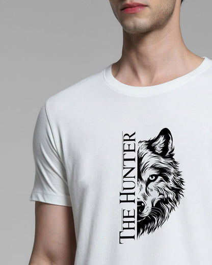 White t-shirt with a wolf graphic and 'The Hunter' text on a gray background